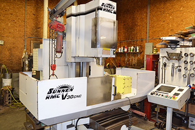 CNC machine shop equipment at Precision Machine Service.